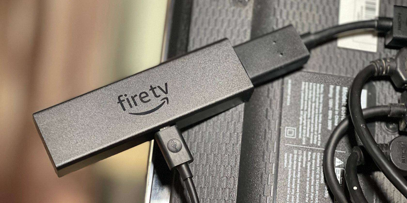 amazon Fire TV stick 4K Max connected to back of TV