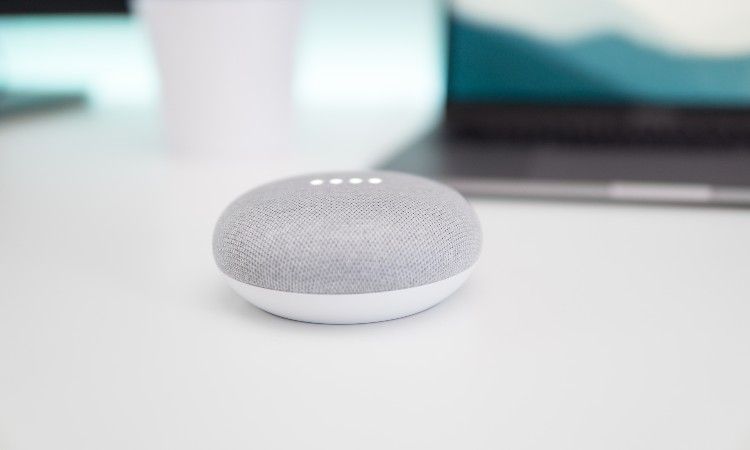 gray-bluetooth-speaker-on-white-counter