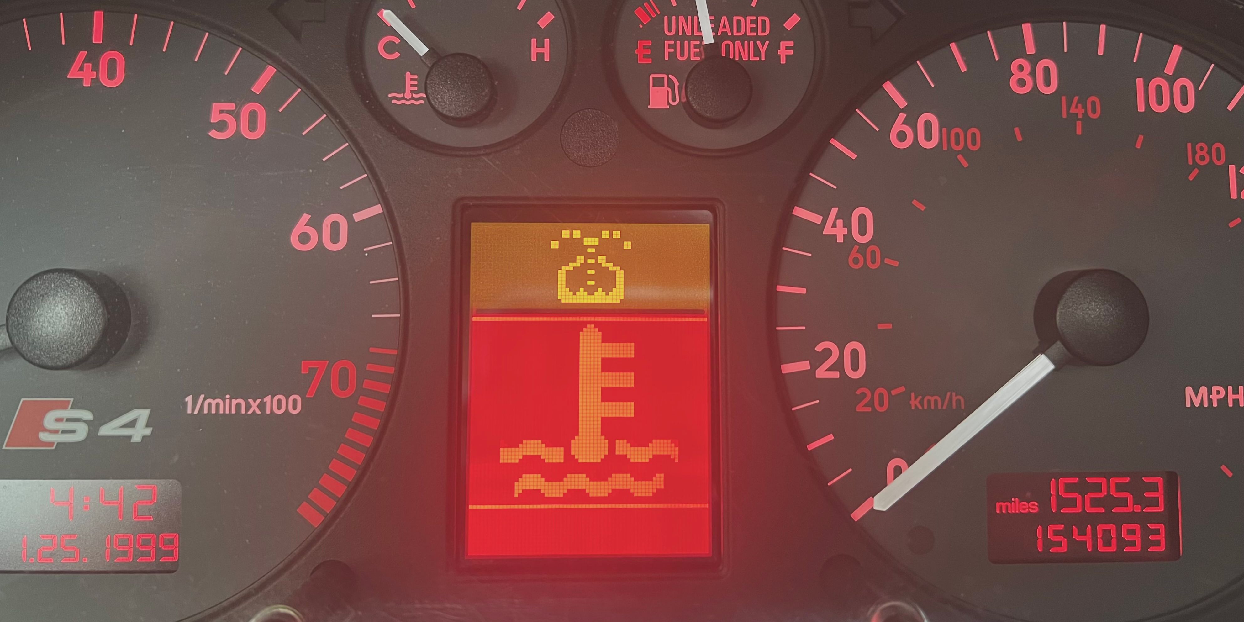 image of coolant light on a dashboard