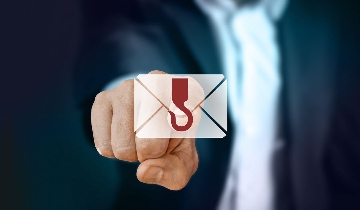 Finger pointing at an email icon