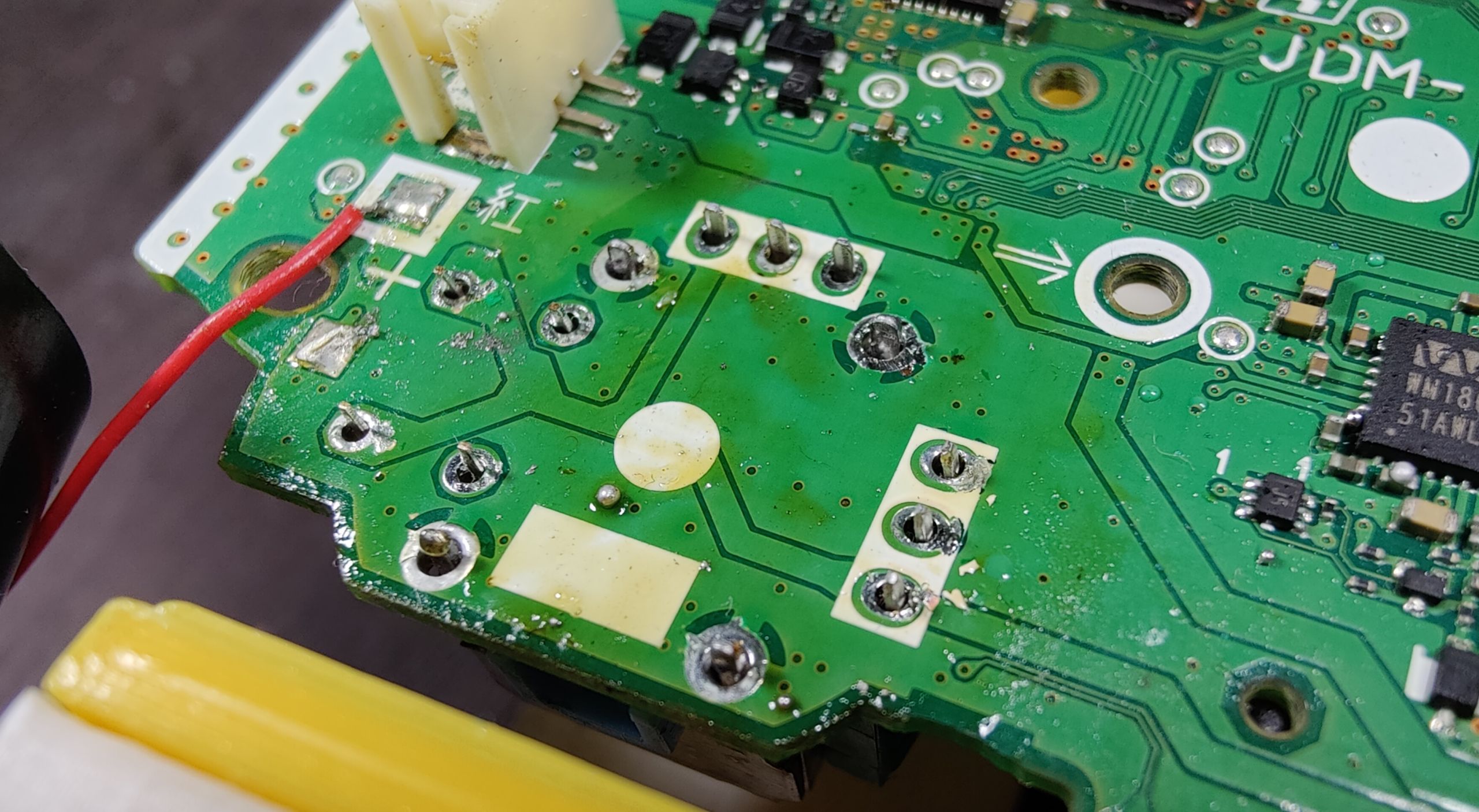 Successfully desoldered components with leads visible on the PCB