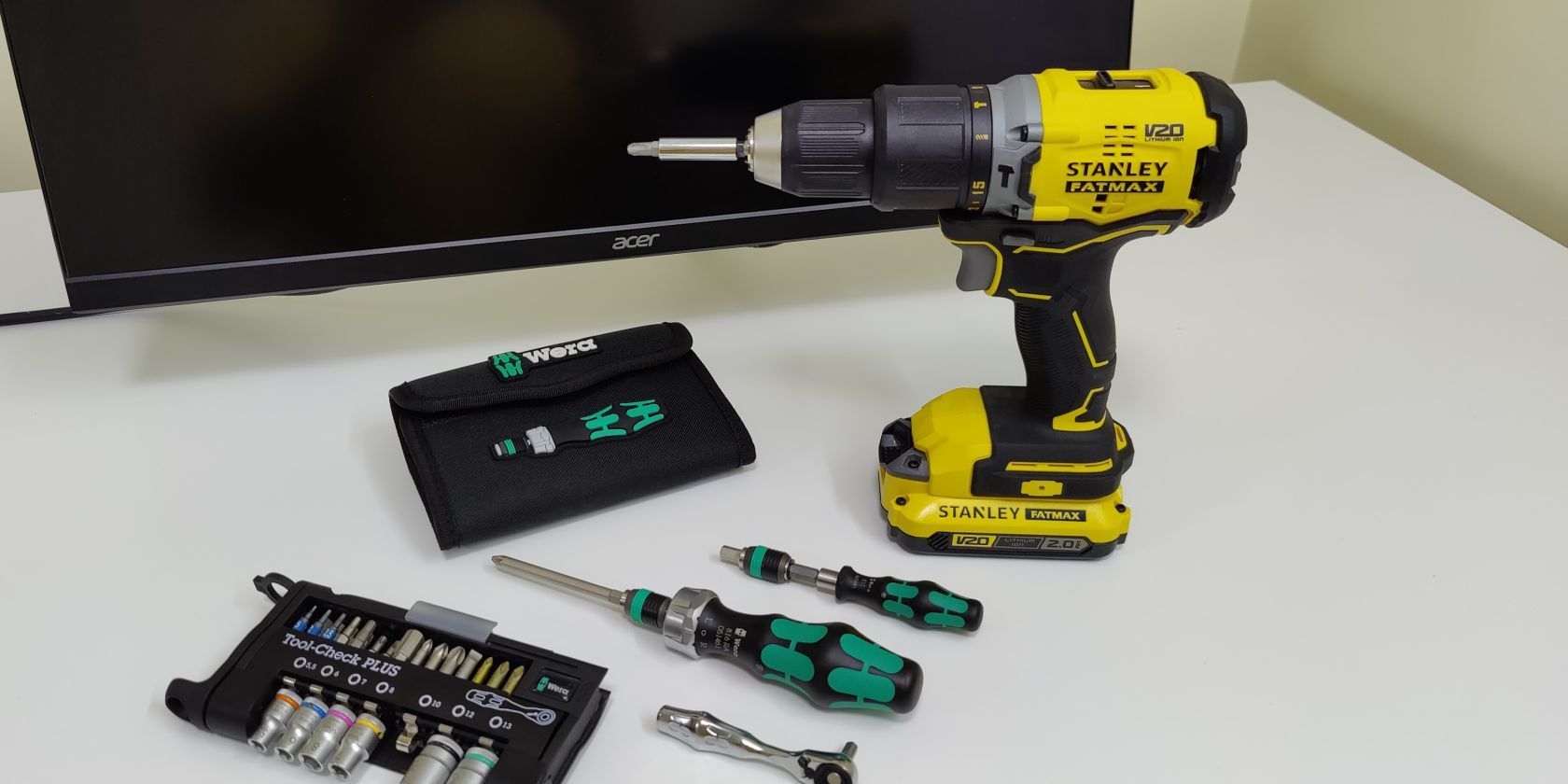 Stanley Fatmax cordless drill displayed alongside Wera hand tools