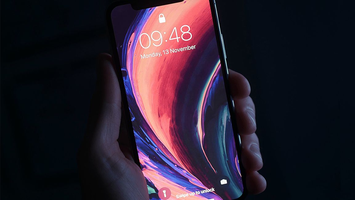 iPhone with abstract wallpaper