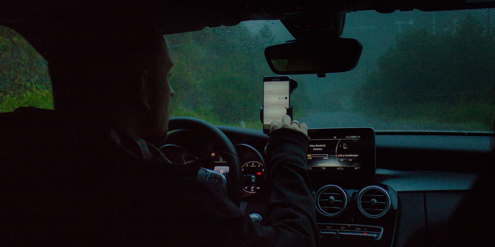 man using phone for navigation