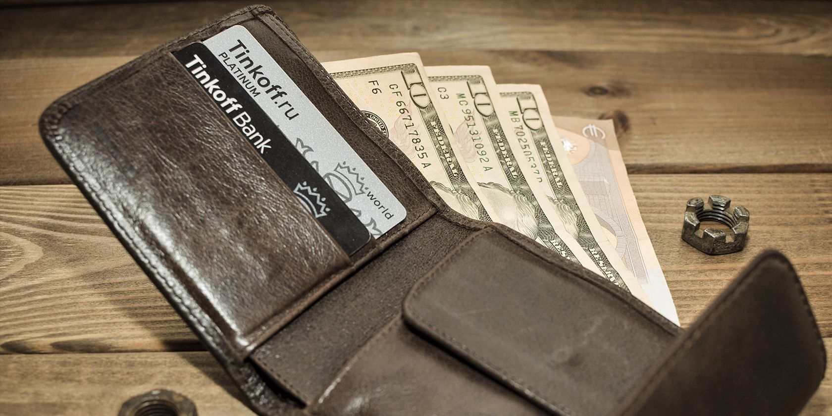 Money in a brown wallet