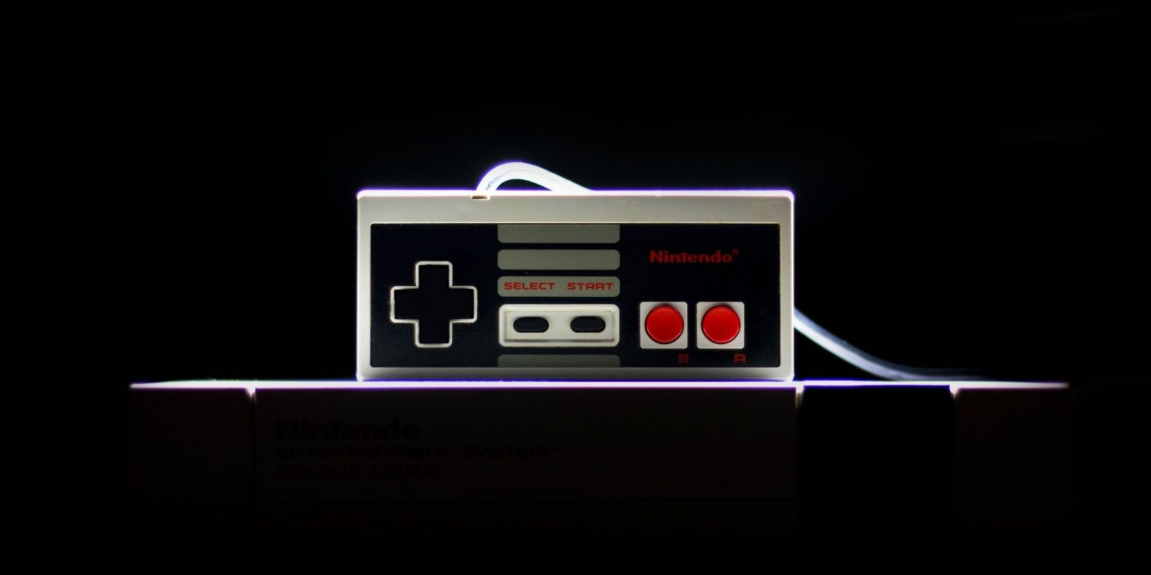 An image of a backlit NES controller