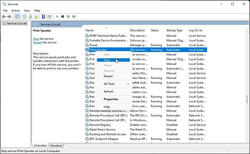 Opción de parada del servicio de cola de impresión en Servicios MMC en Windows 11