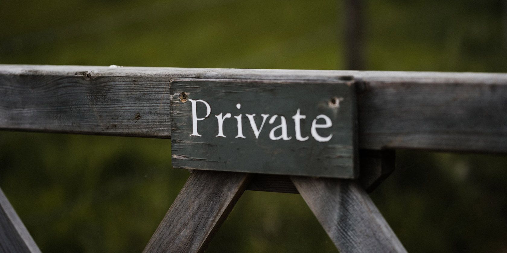 Private sign on fence