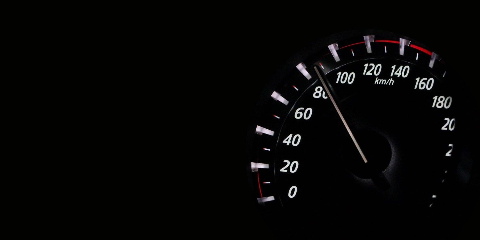Car speedometer captured in low light