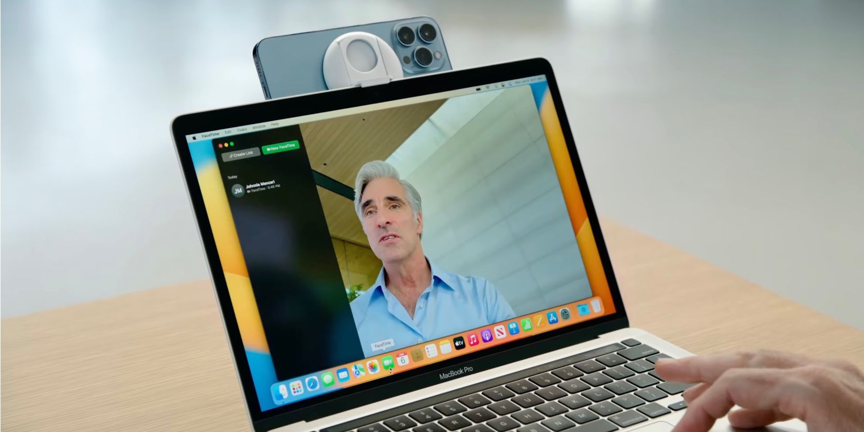The MacBook uses the iPhone as a webcam