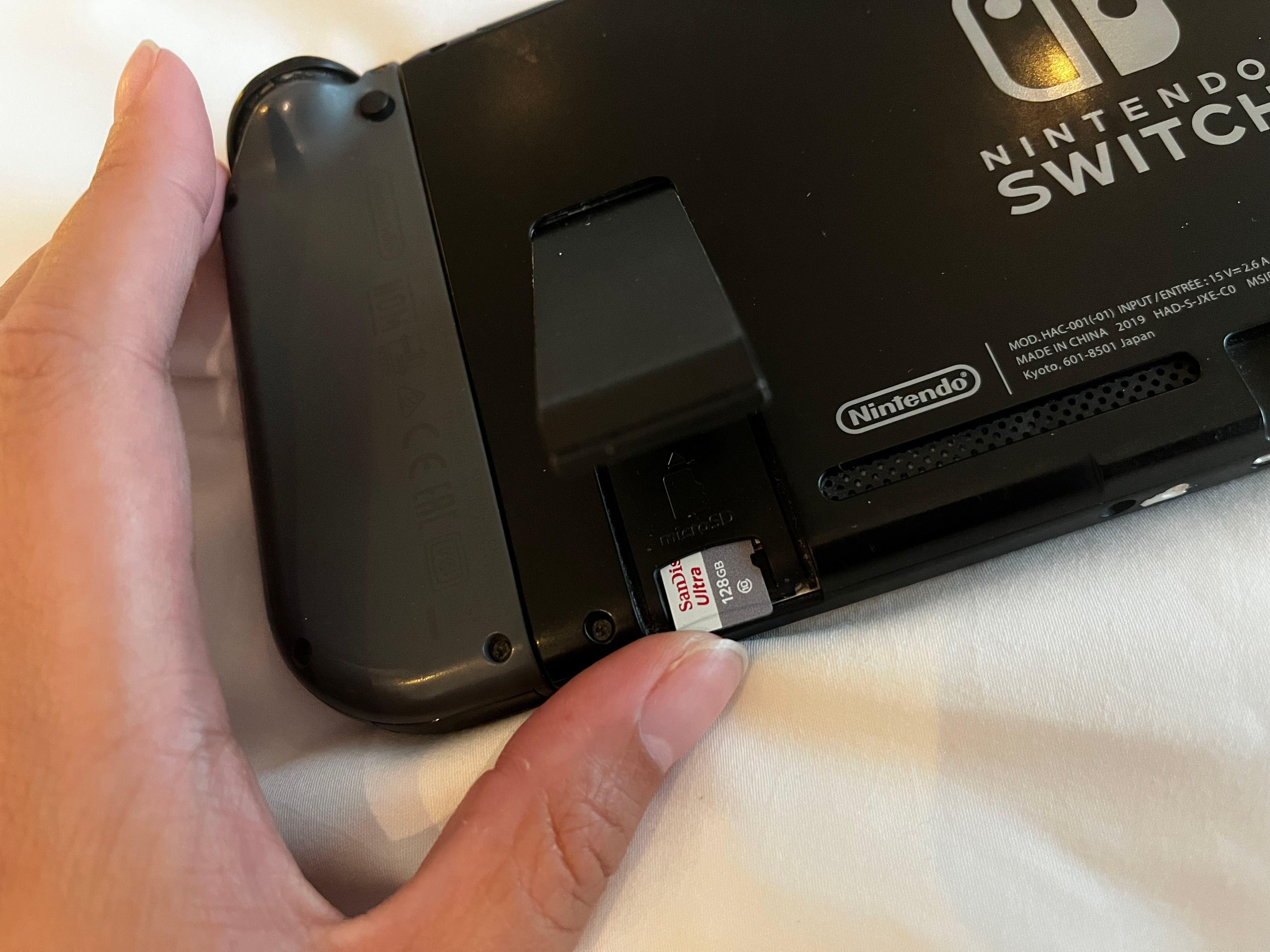 Insert the microSD into Nintendo Switch