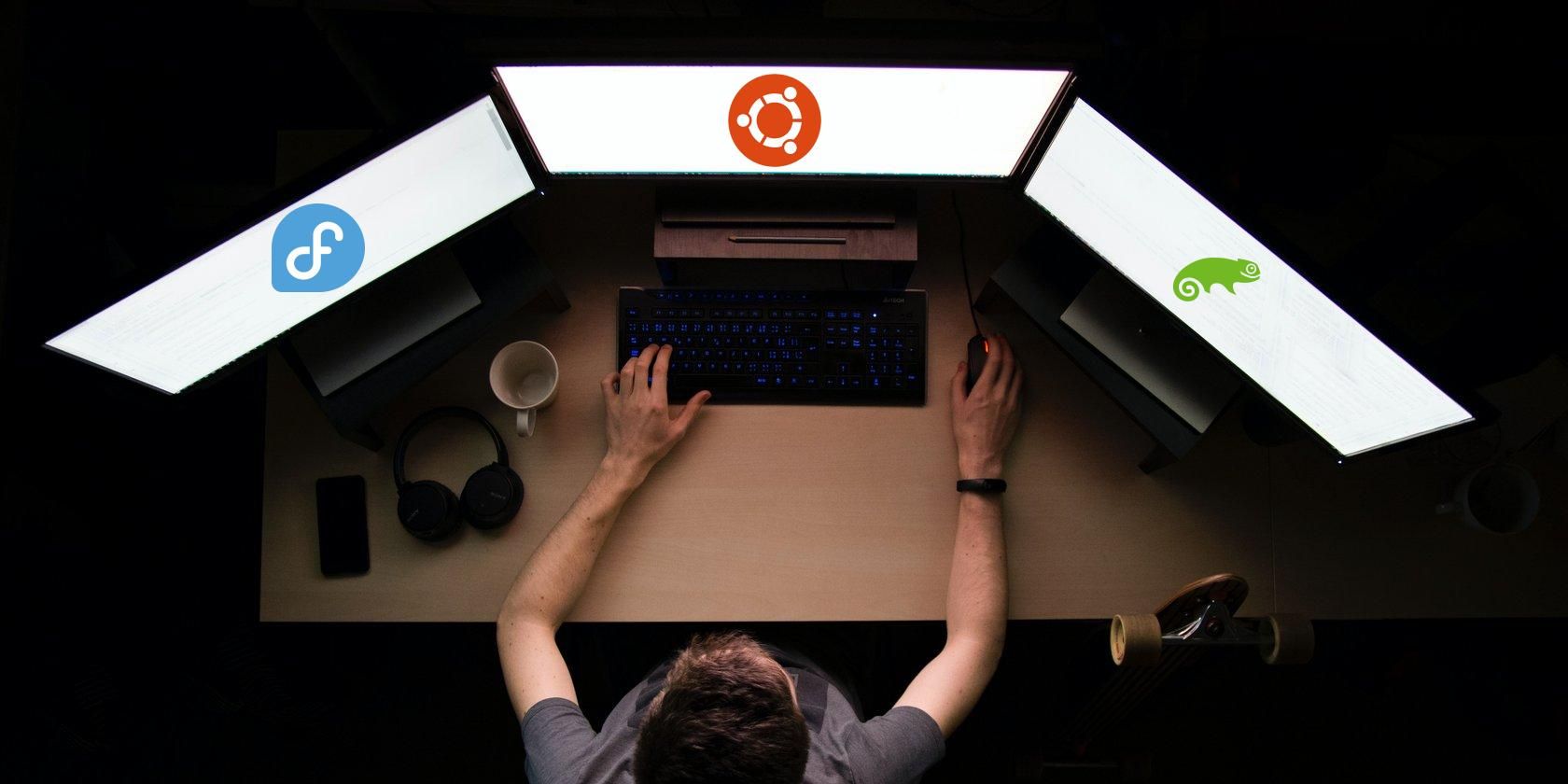 Man using Computer with Fedora Ubuntu and openSUSE Linux