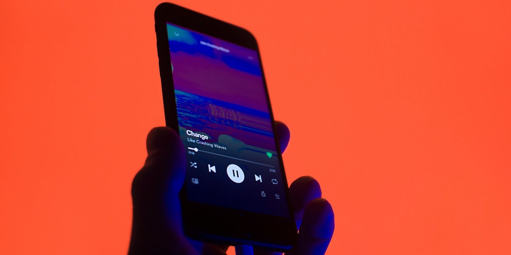 Person Holding Phone With Spotify Featured Image