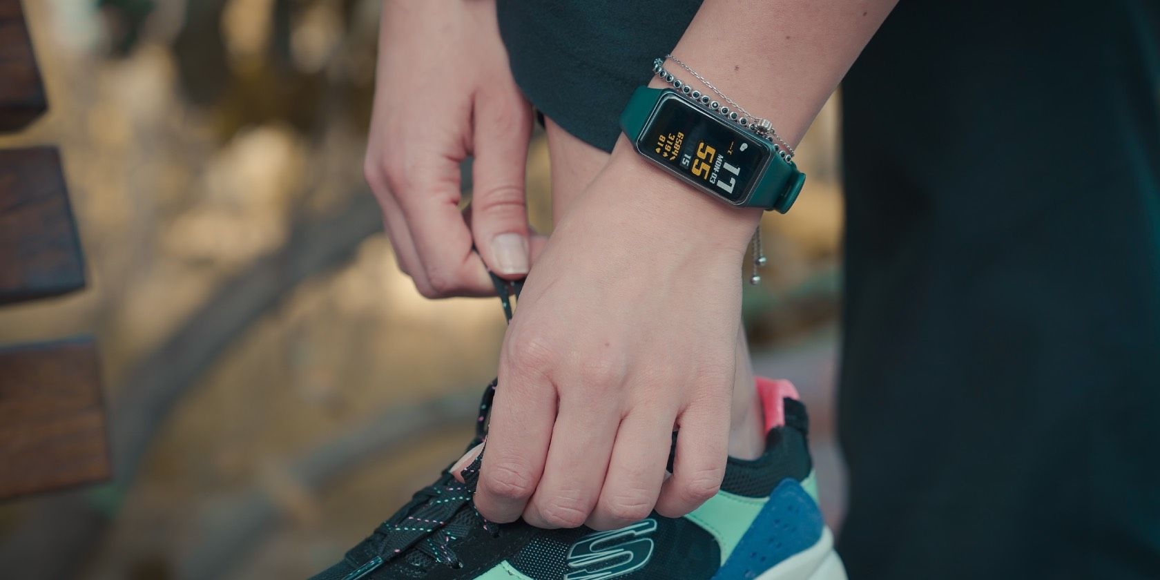 photo of a person wearing a fitness tracker 
