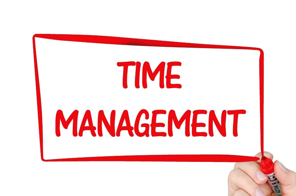 Time management written in red marker