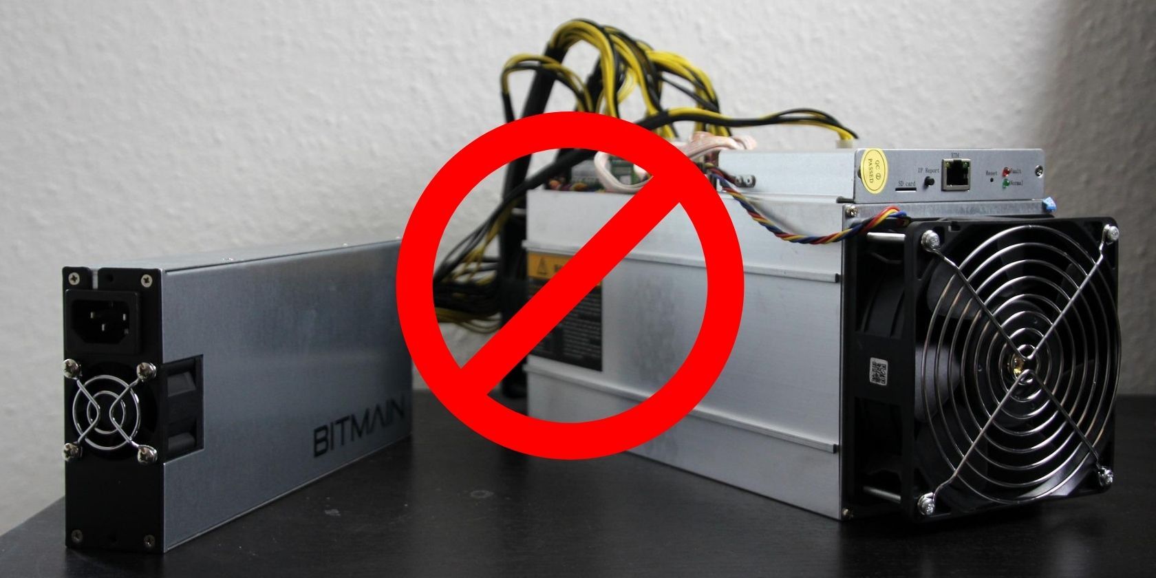 bitmain asic miner behind red restricted logo