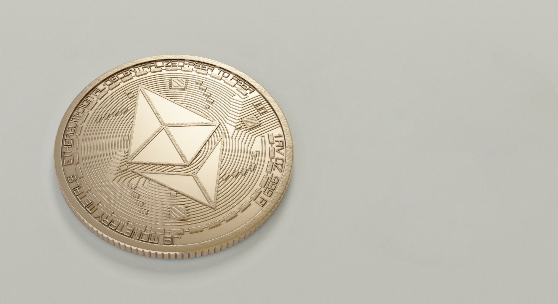 photo of gold ethereum coin