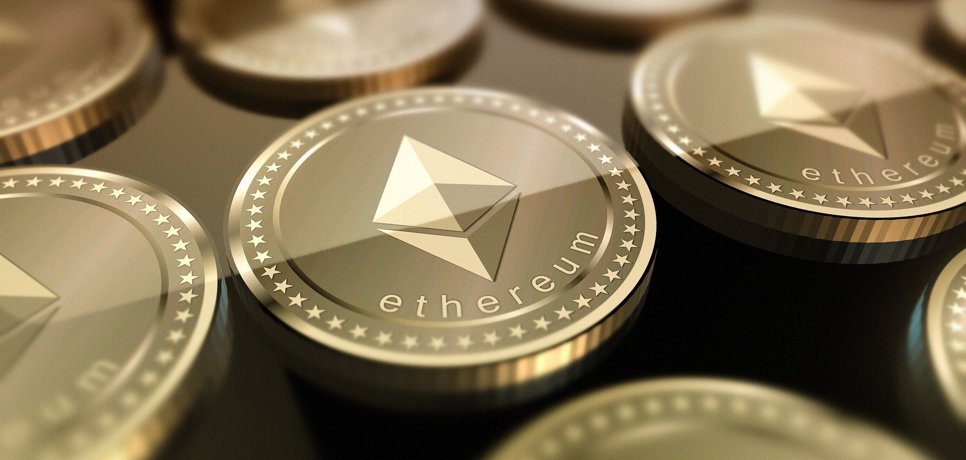 rows of gold ethereum coins