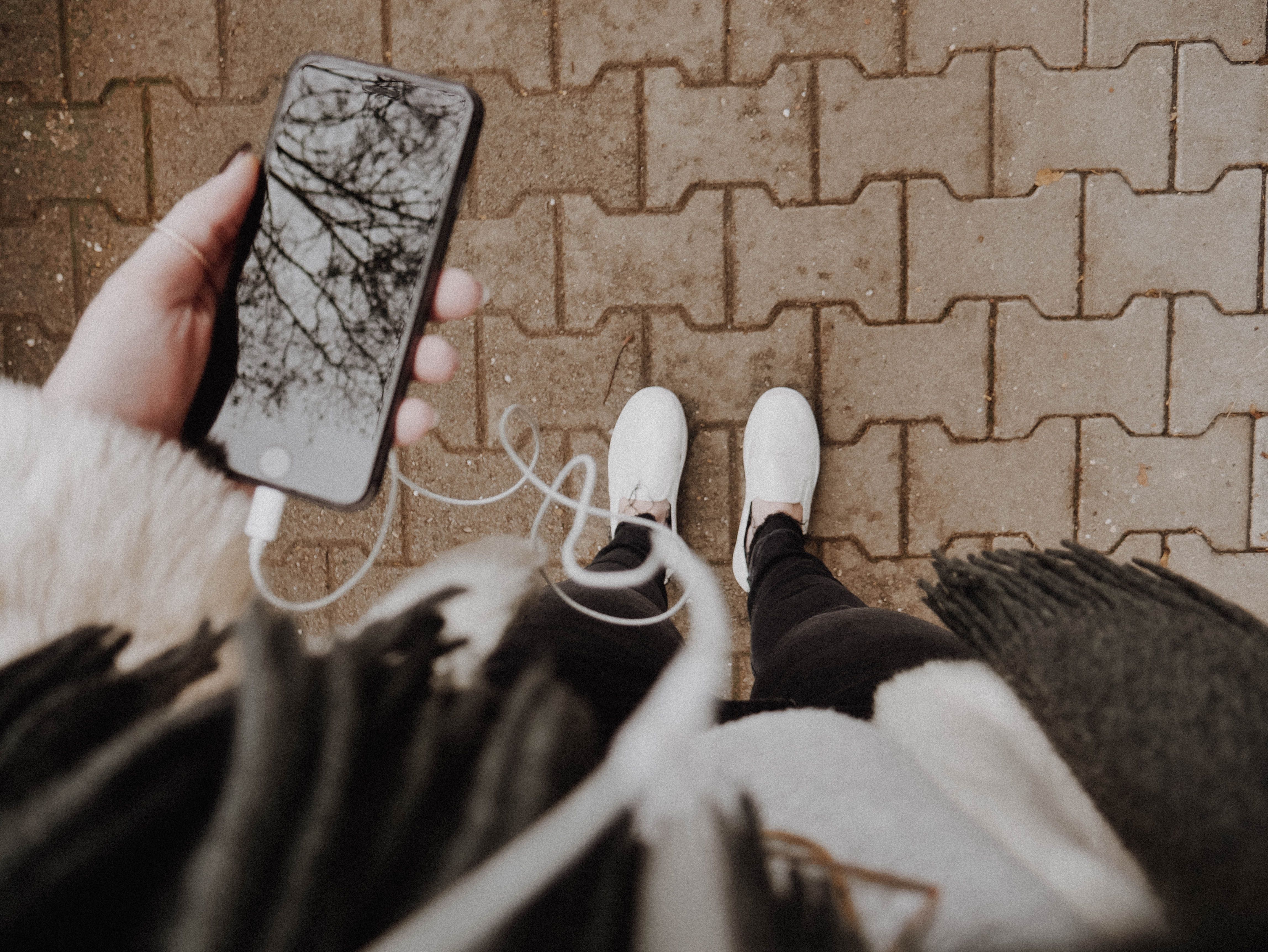 person listening through their headphones