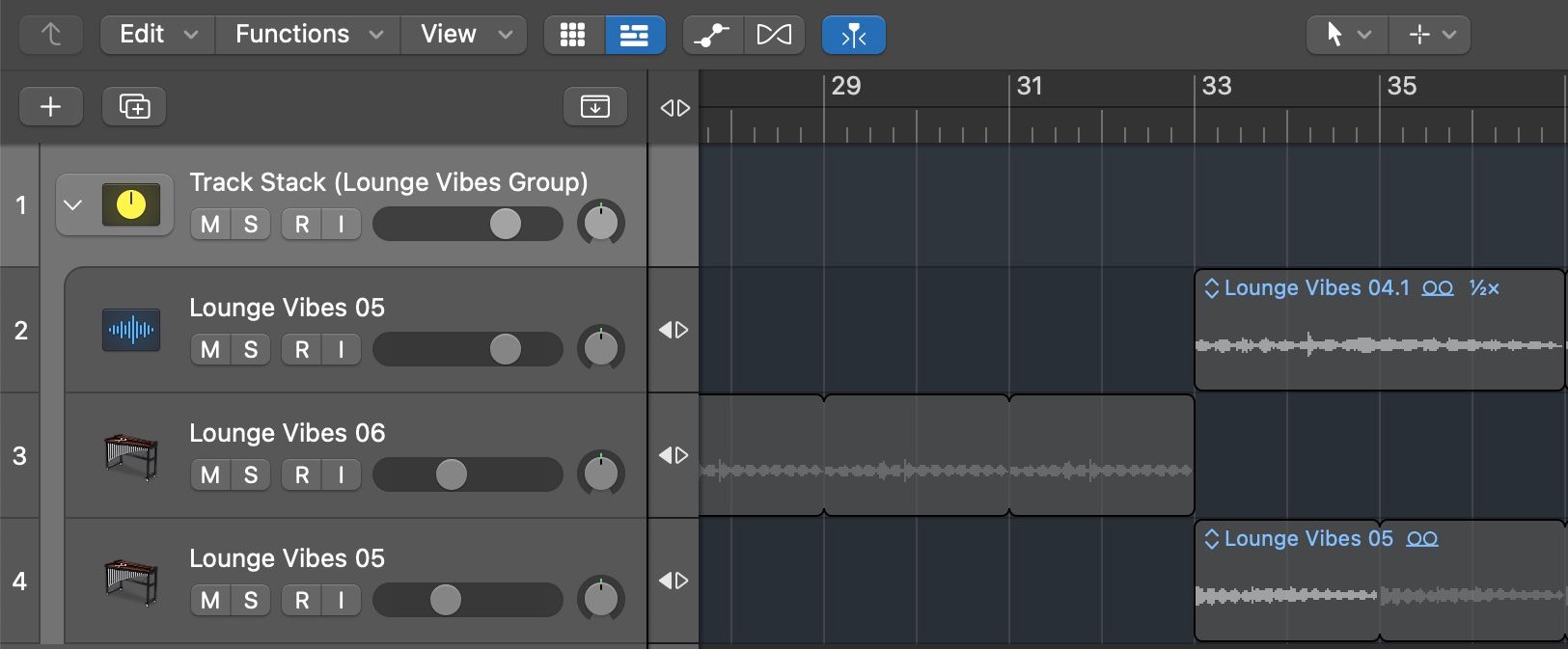 A screenshot showing three tracks grouped together using the Track Stack feature in Logic Pro X