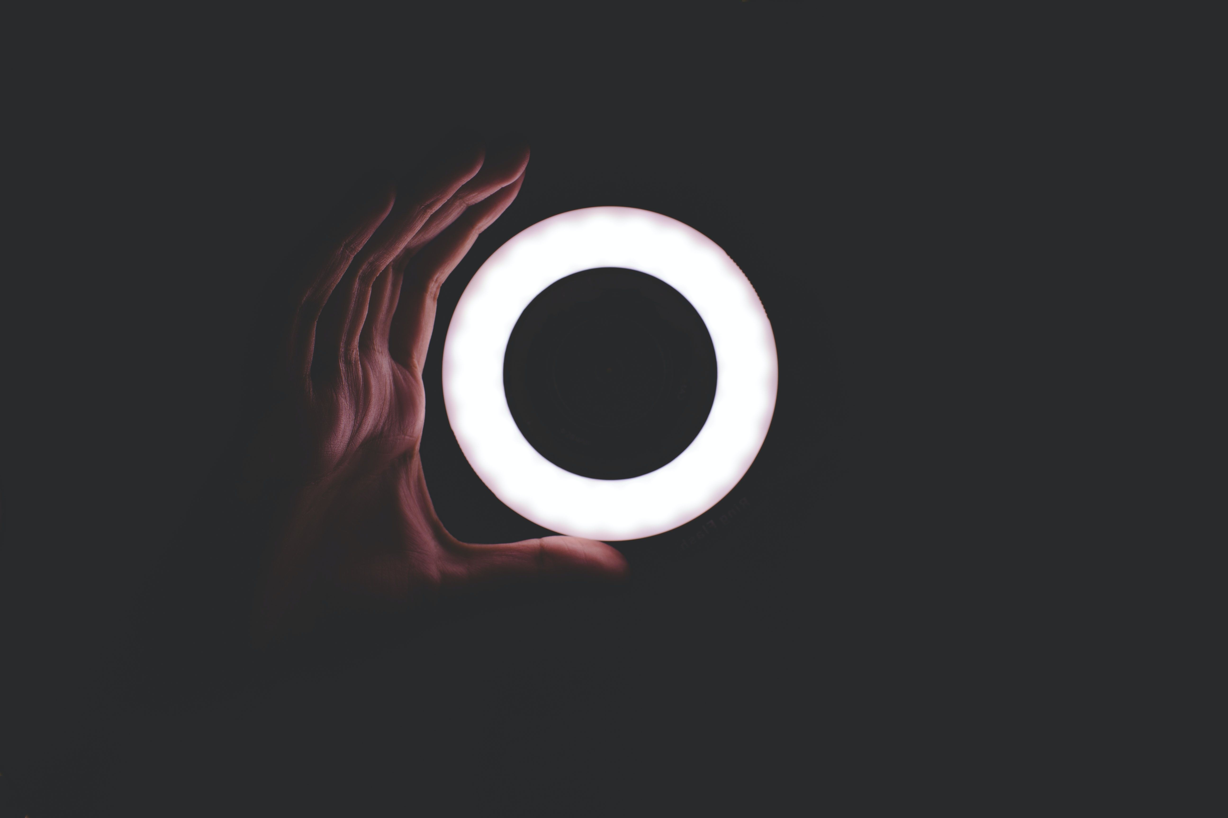 Person Holding Ring Light