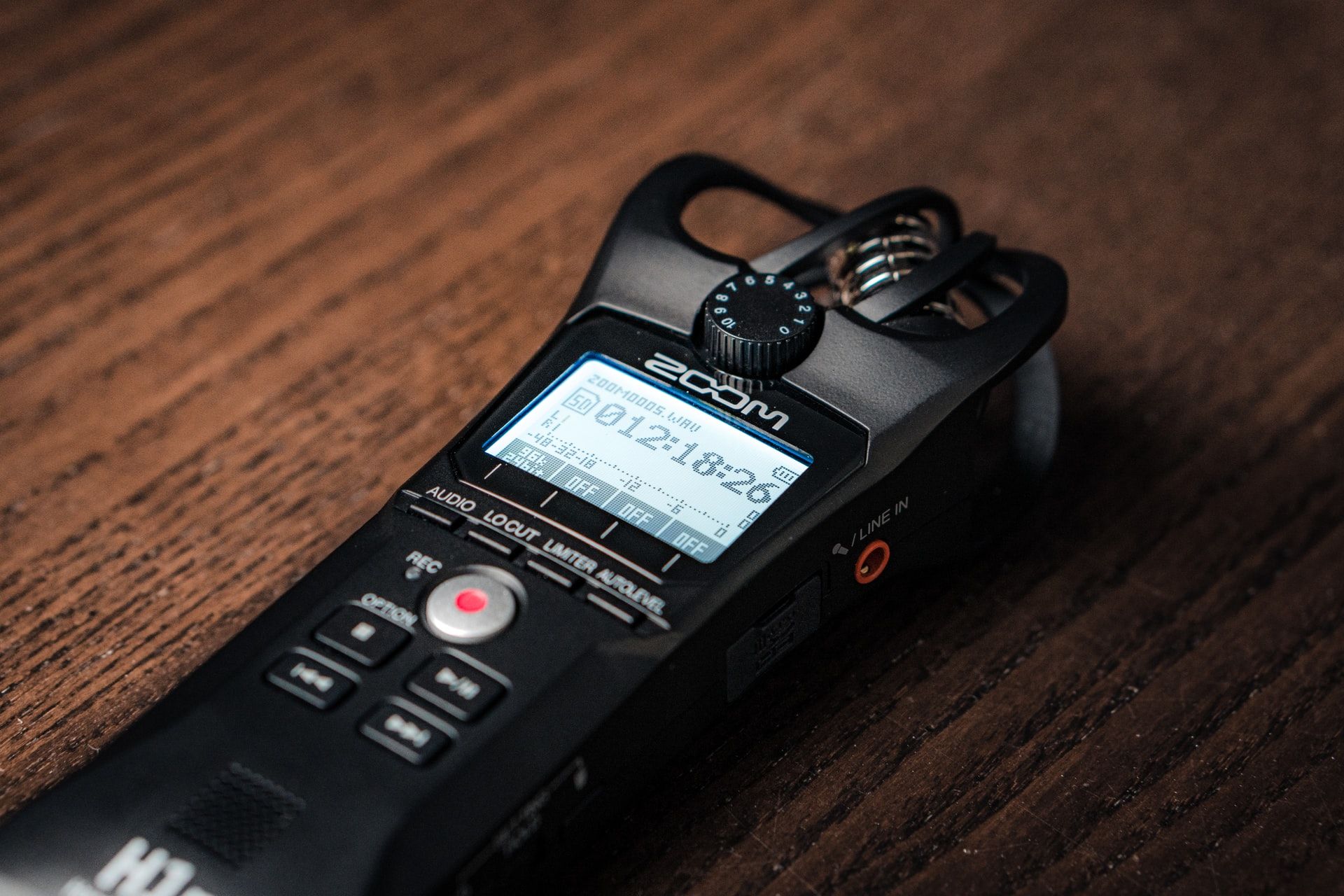 A close up image of a Zoom handheld audio recorder
