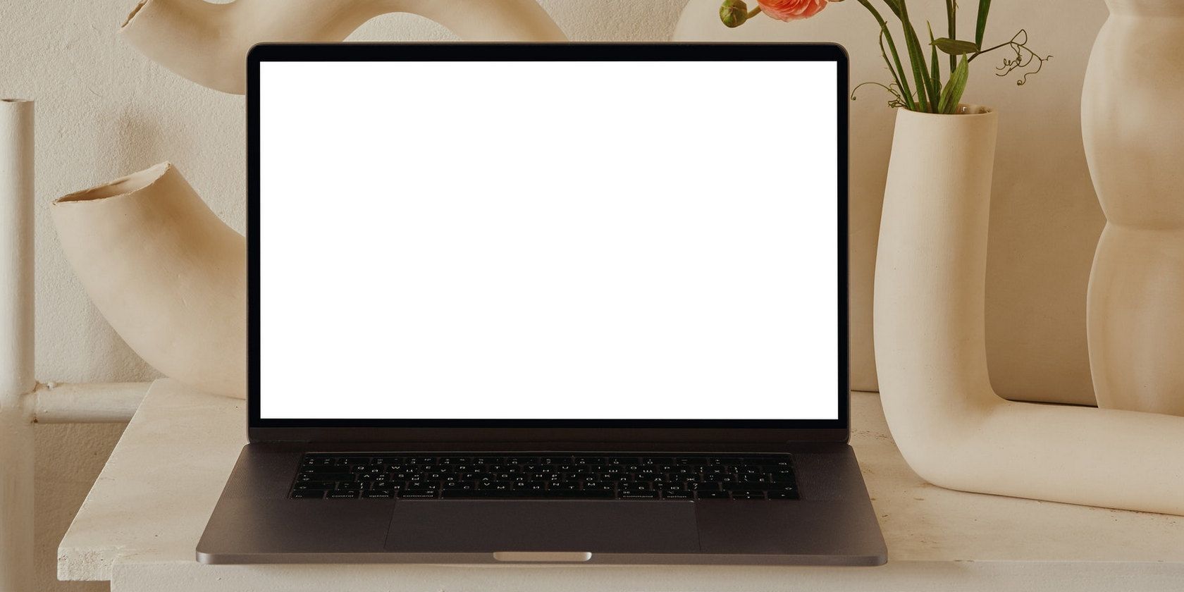 White screen laptop on a table
