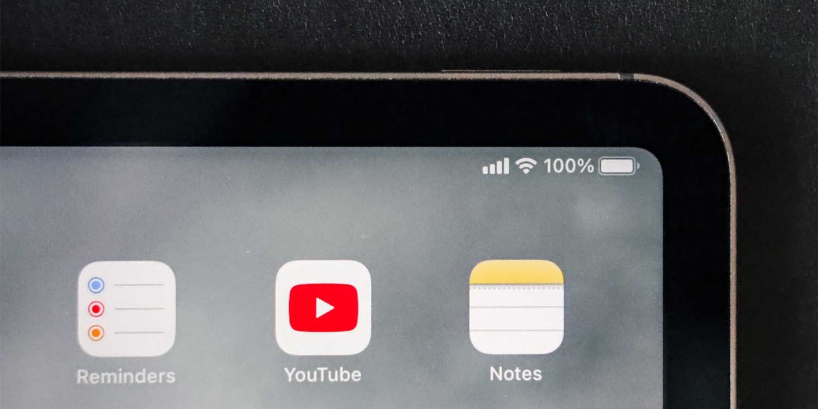 Corner of Apple device screen showing the Notes app.