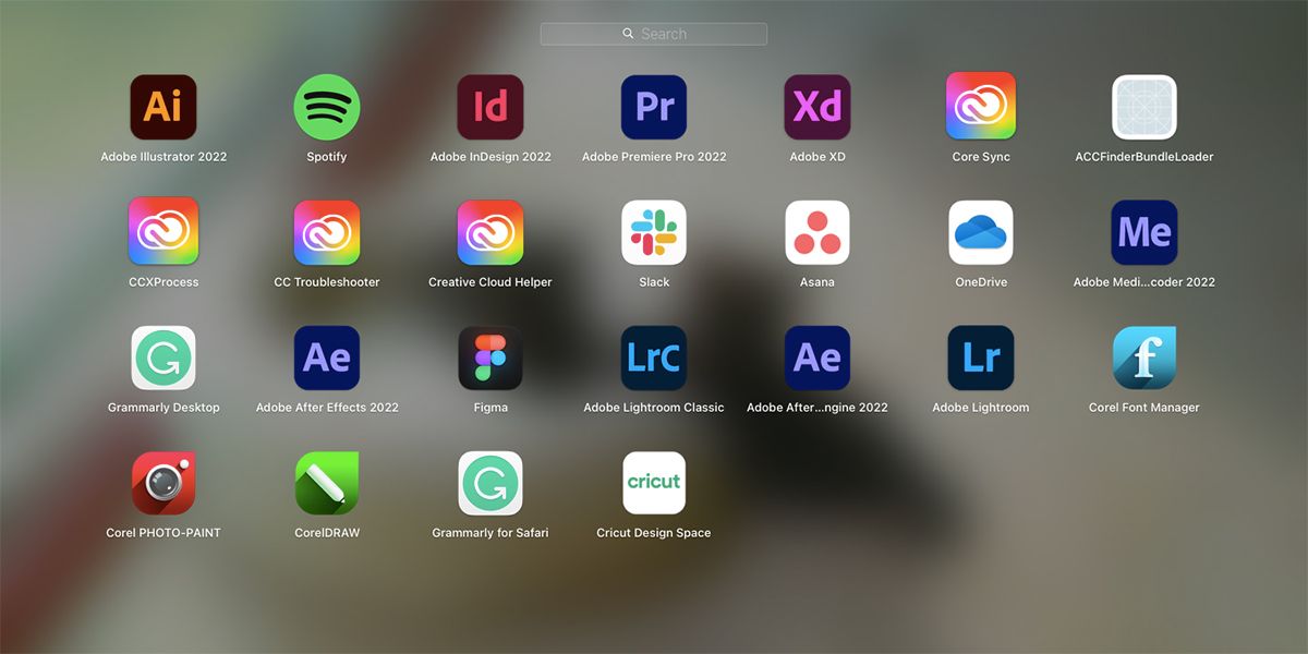Installed apps on Apple Mac including Adobe apps and CorelDRAW suite.