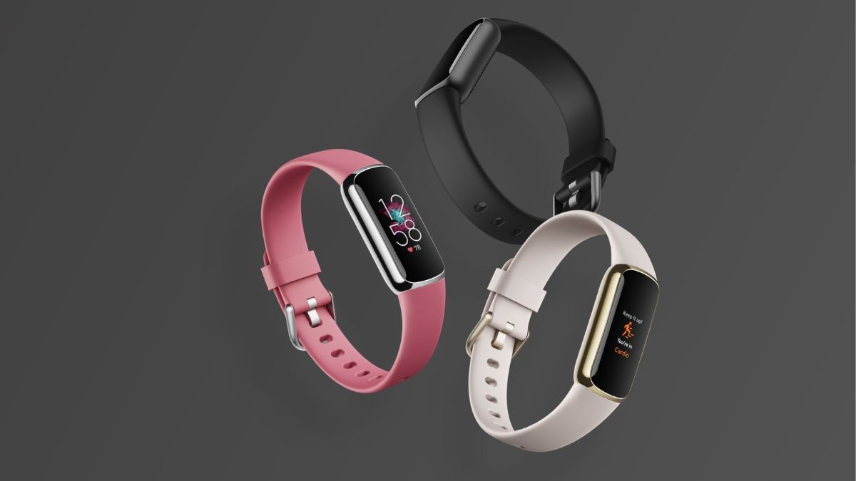 Fitbit Luxe in pink, black, and gray
