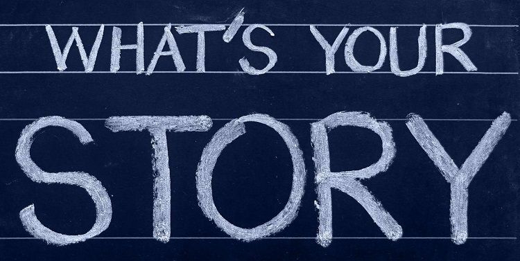 Image of chalkboard with the words what's your story written on it