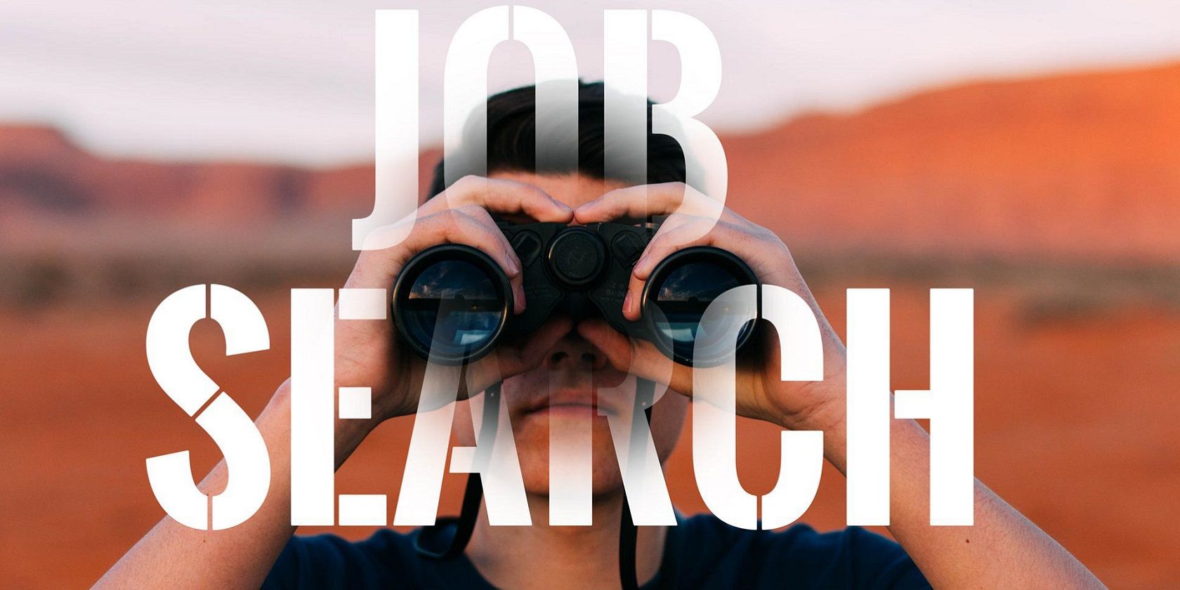 Image of man holding binoculars with words Job Search in front of him