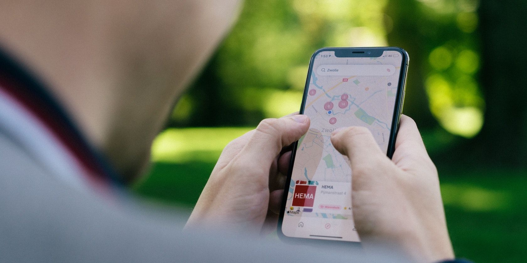 Person Holding iPhone with Maps featured image