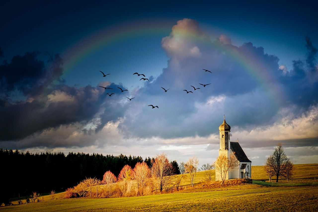 Rainbow over church