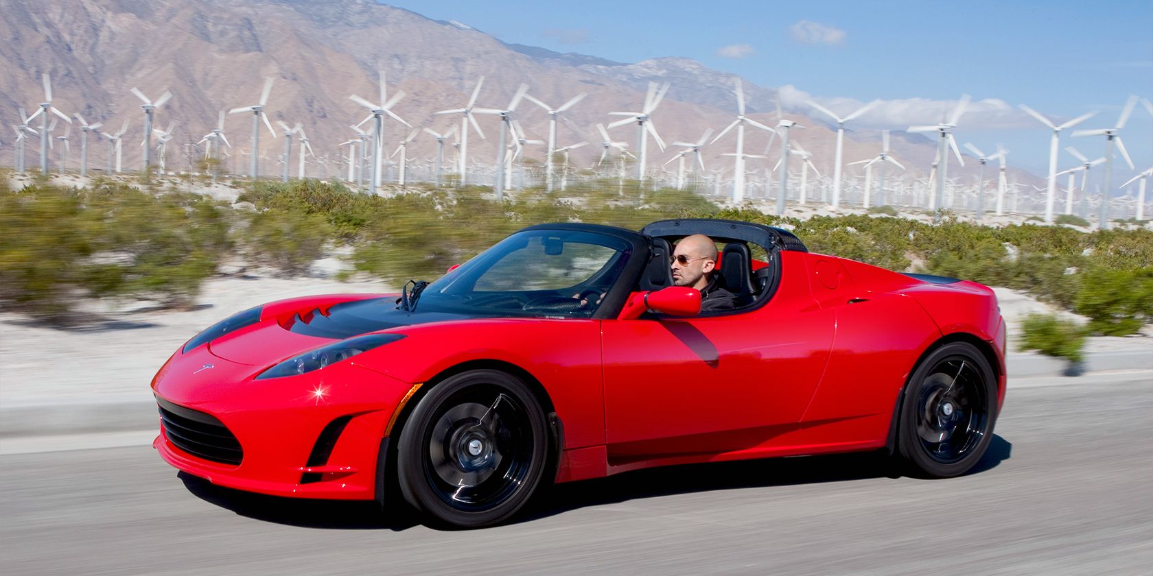 a red Tesla Roadster
