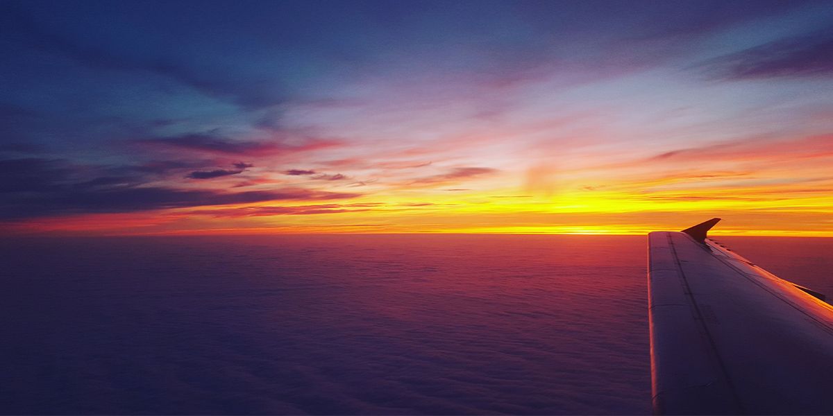 Sunset captured through an airplane window