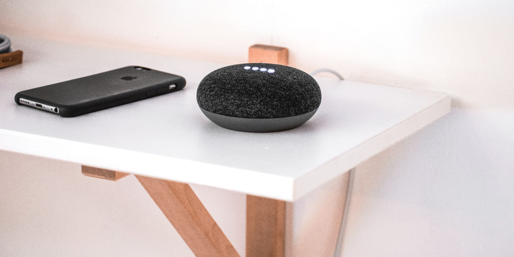 black google home on a table