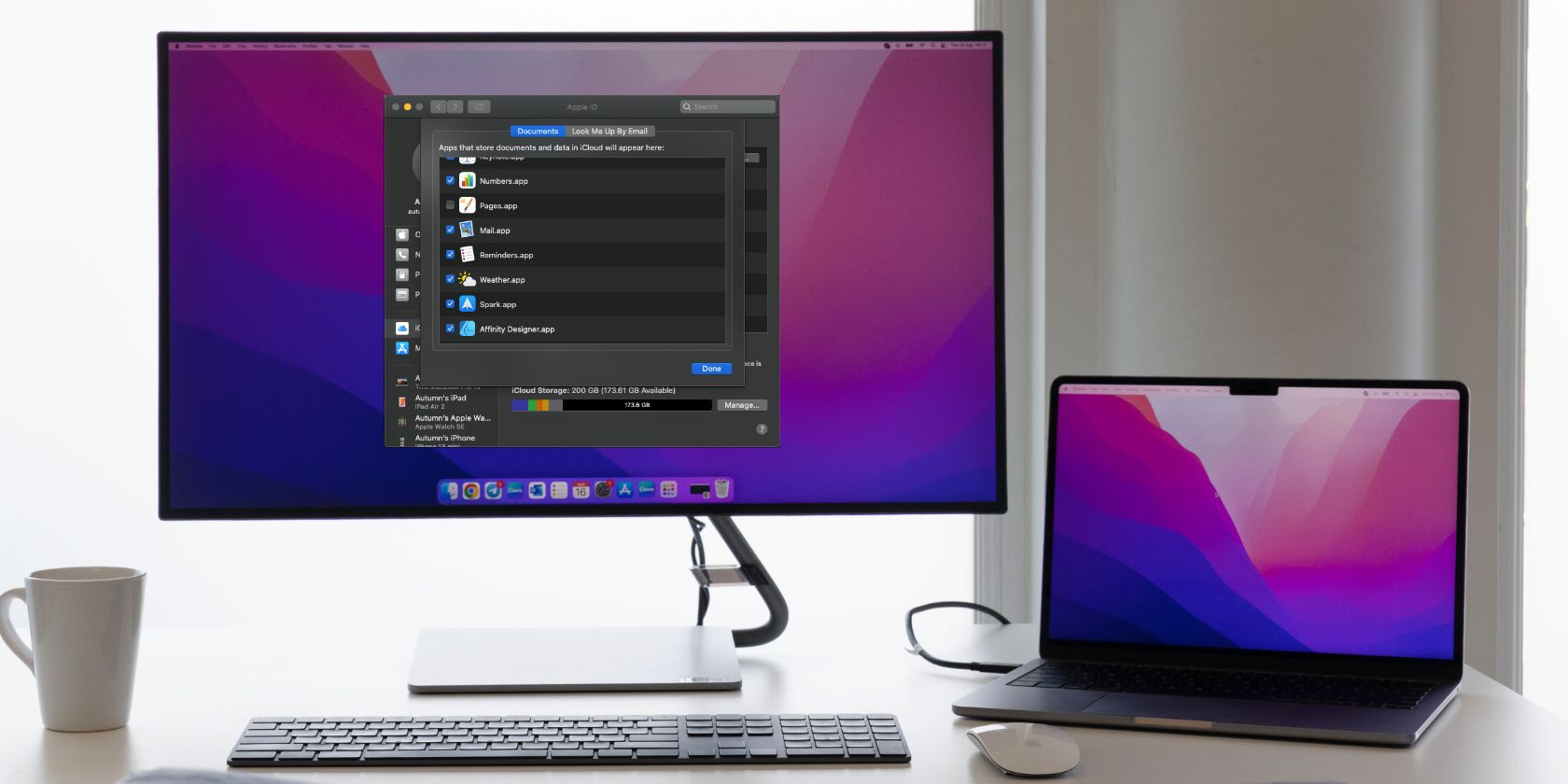 Mac computer and monitor on a desk with settings menu open