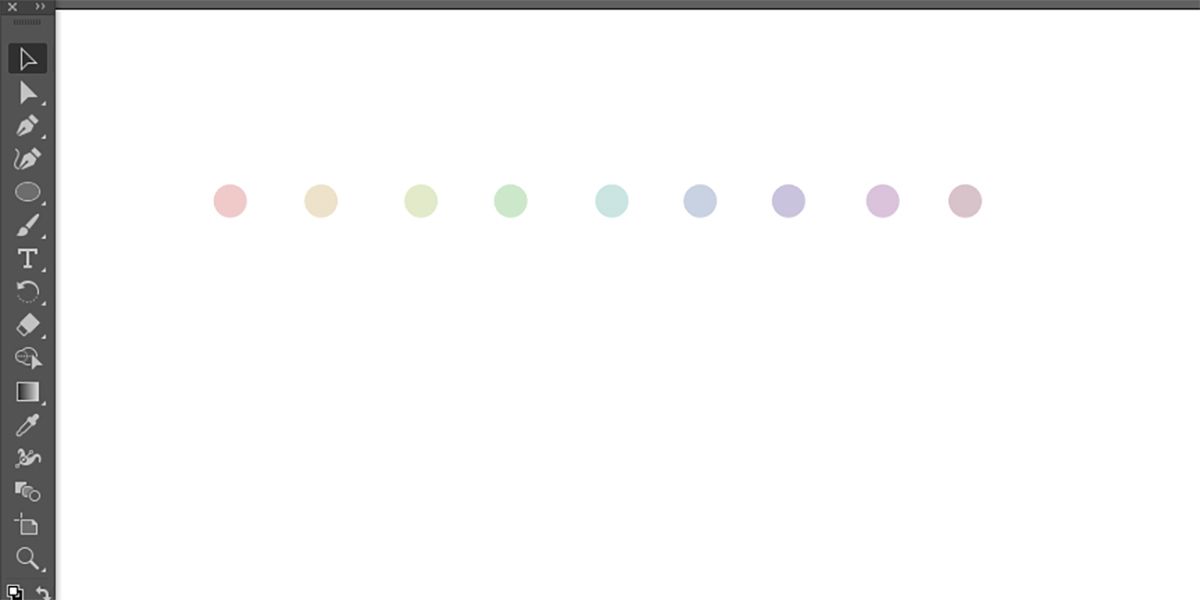 White Illustrator canvas with nine coloured circles in a line.