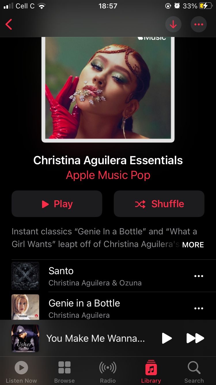 screenshot showing christina aguilera essentials playlist on apple music for mobile