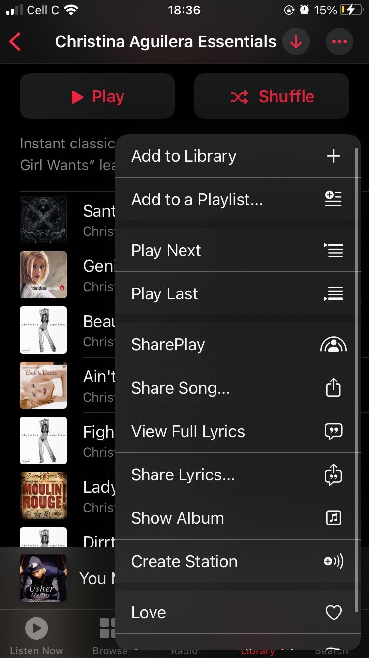 screenshot showing drop-down menu for christina aguilera essentials playlist on apple music mobile