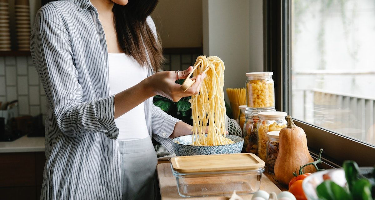 woman cooking pasta