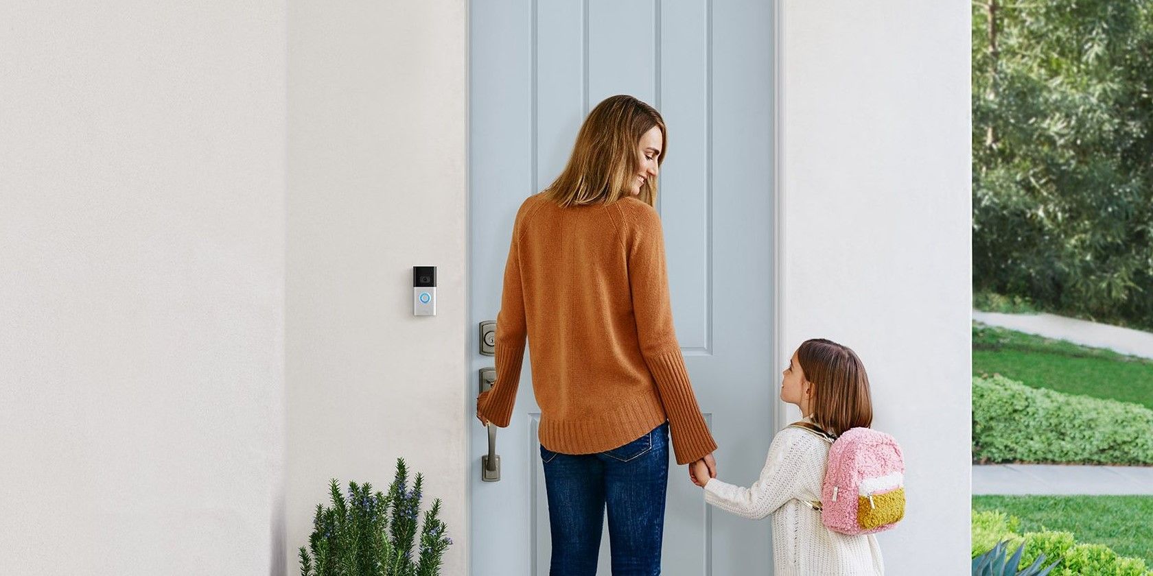 Woman and girl ring doorbell