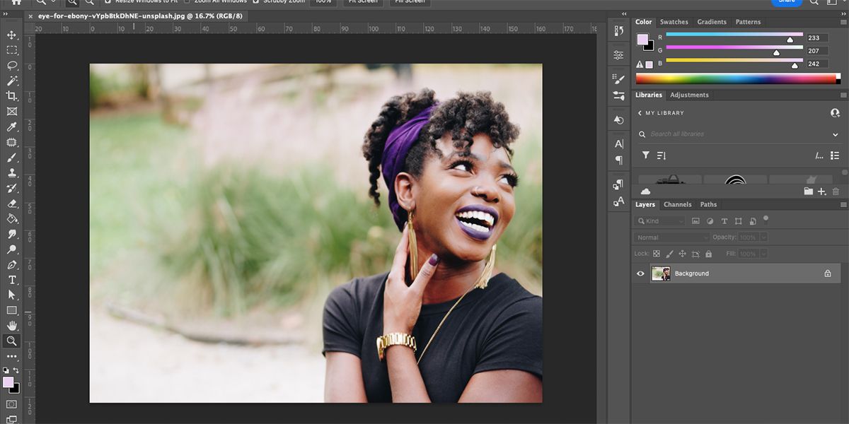 Photoshop artboard with photo of woman smiling.