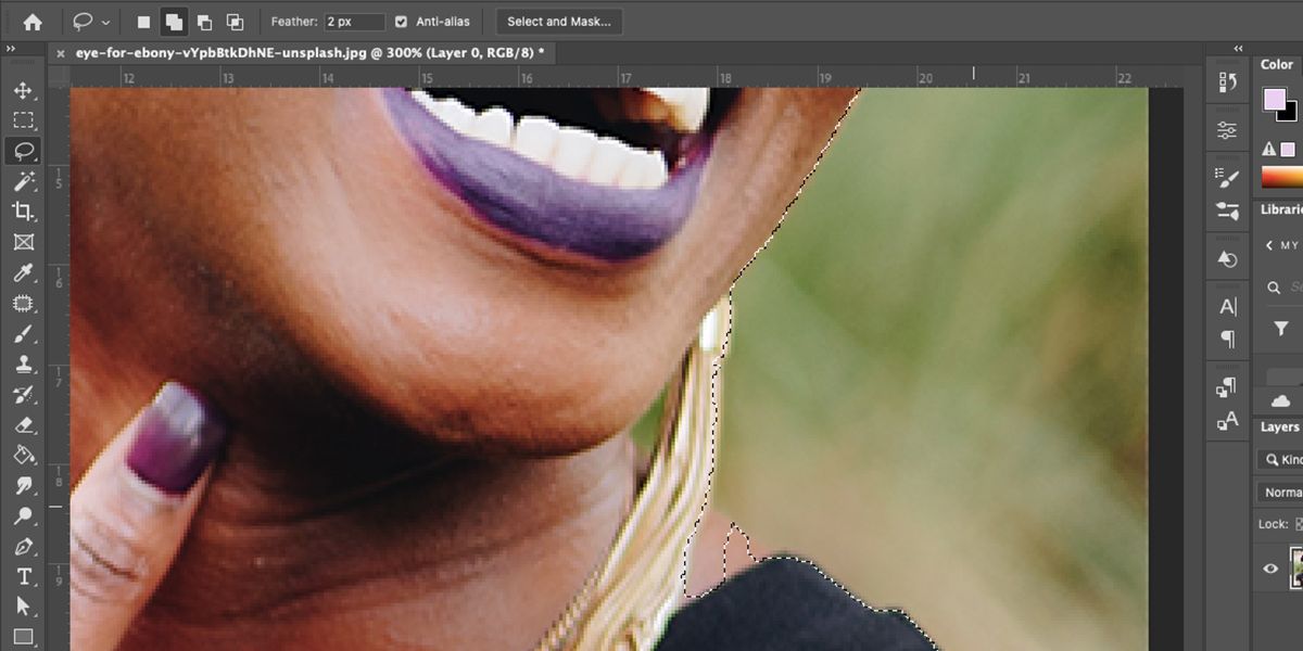 Photoshop artboard with zoomed in selection of woman's mouth.