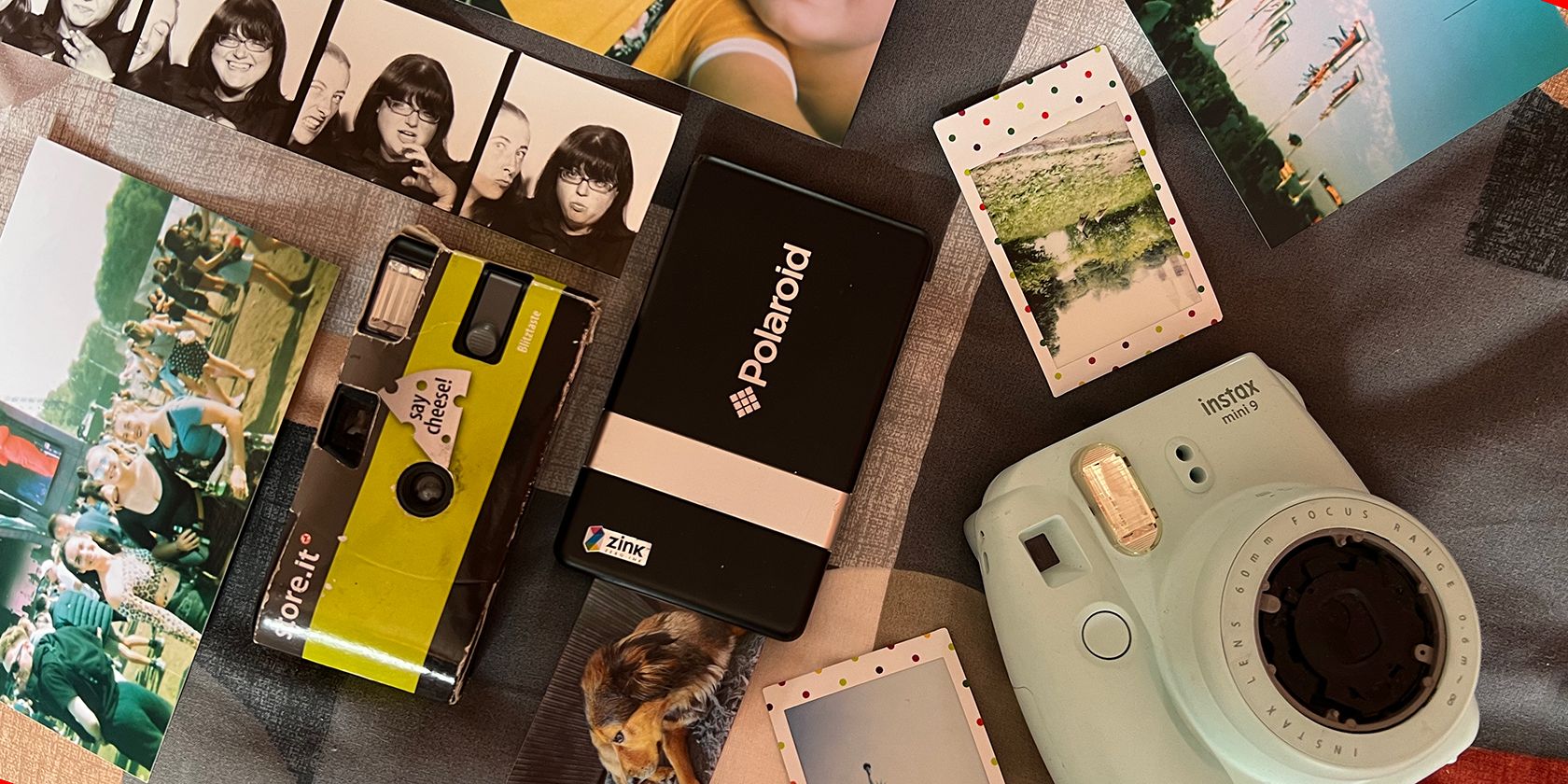 Flatlay of Polaroid PoGo printer, Instax camera, disposable film camera, and printed photos.