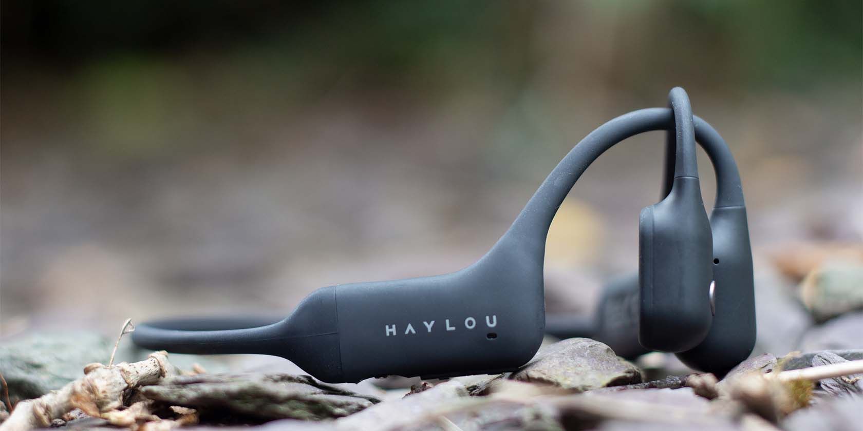 Haylou-PurFree-BC01-Bone-Conduction-Headphones-on-Flint-Backdrop-1