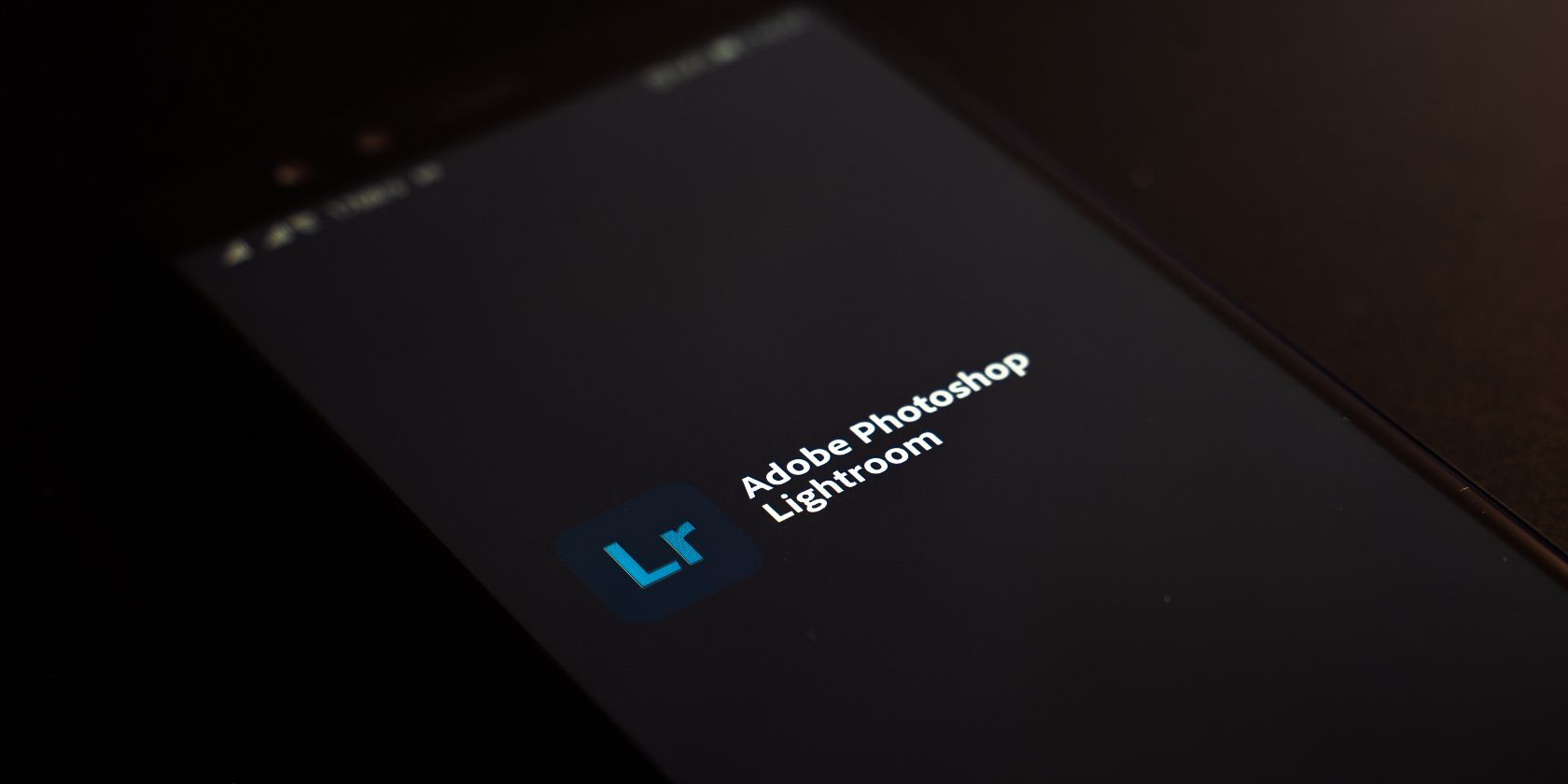 Photo of the Adobe Lightroom app on a phone