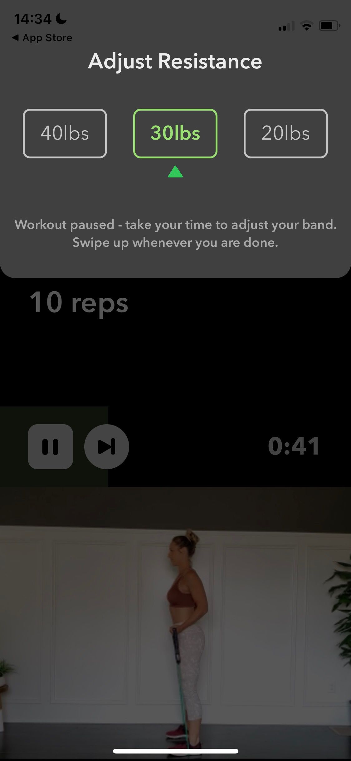 Screenshot of Powermove showing adjust resistance feature on workout display