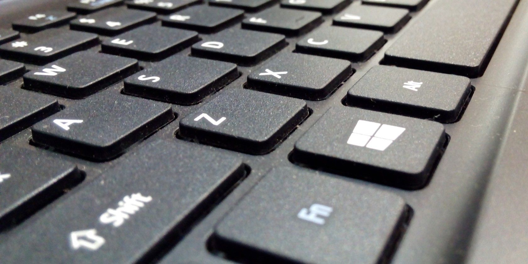 Close Up of Black Keyboard with Shift, Windows, and Alt Keys